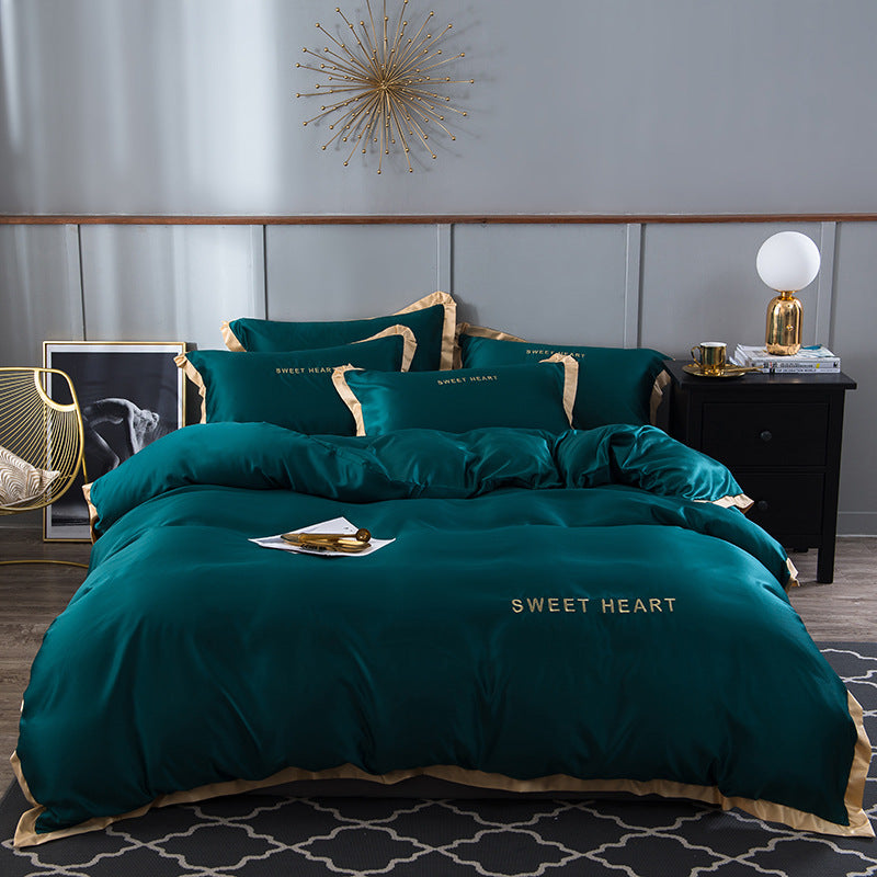 moregrowth101 Washed Silk Bed Sheet in teal color with Sweet Heart embroidery and luxurious design.