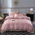 moregrowth101 Washed Silk Bed Sheet in pink with gold trim, luxury bedding for an elegant bedroom.