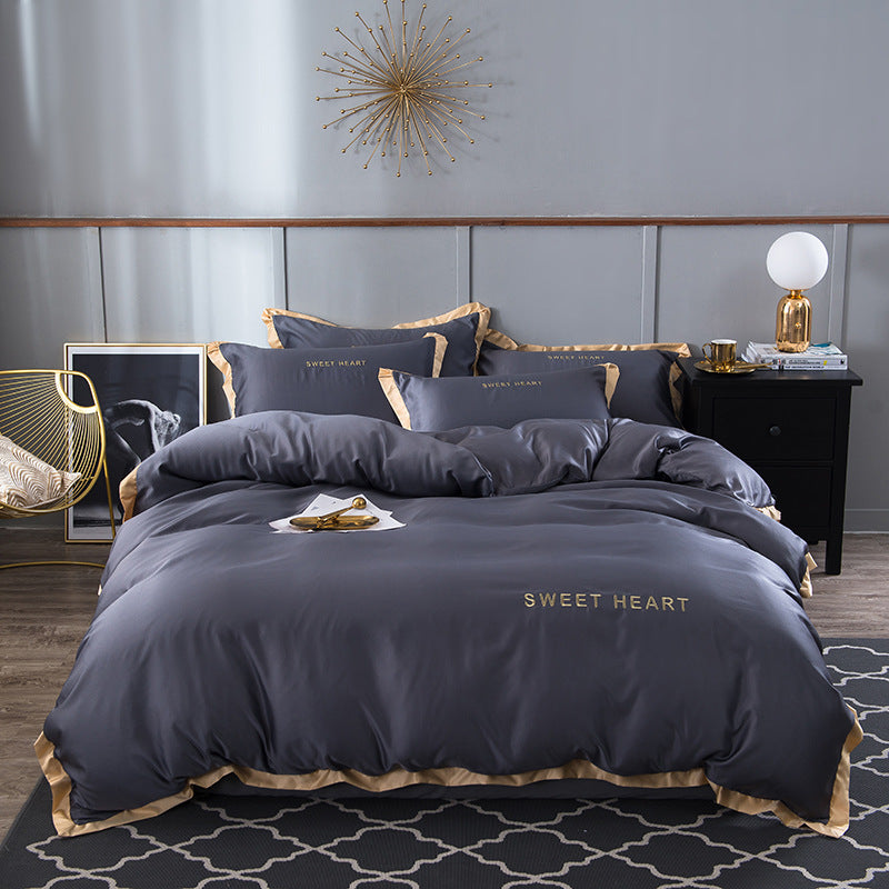 moregrowth101 Washed Silk Bed Sheet set displayed on a stylish bed with decorative pillows and modern decor.