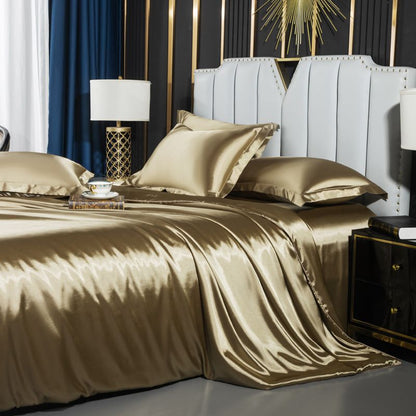 Washed Silk Four-Piece Bedding by moregrowth101 in gold color on a luxurious bed.