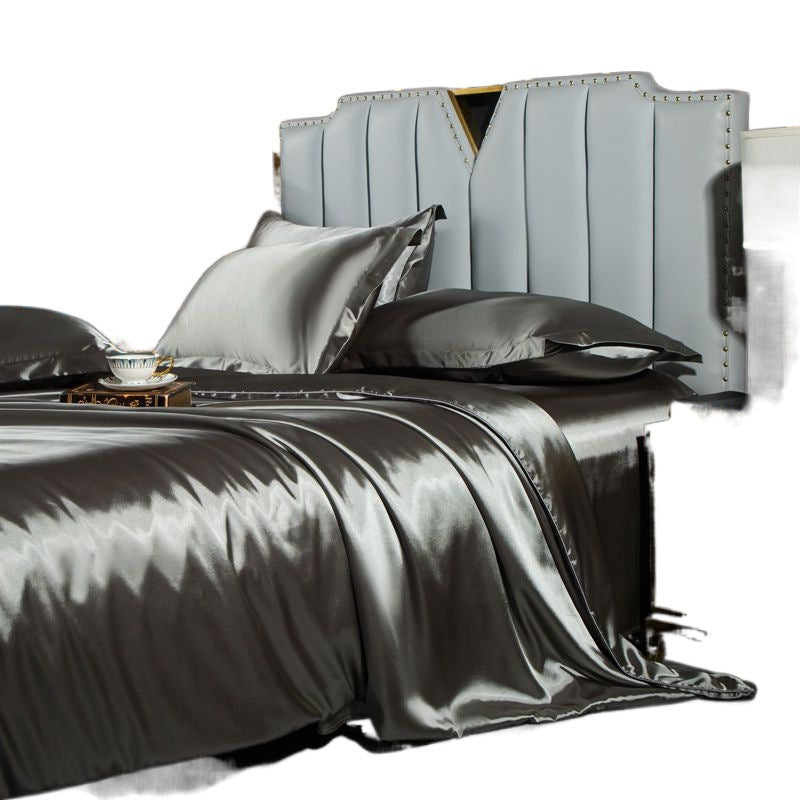 moregrowth101 Washed Silk Four-Piece Bedding Set featuring elegant gray sheets and stylish headboard design.